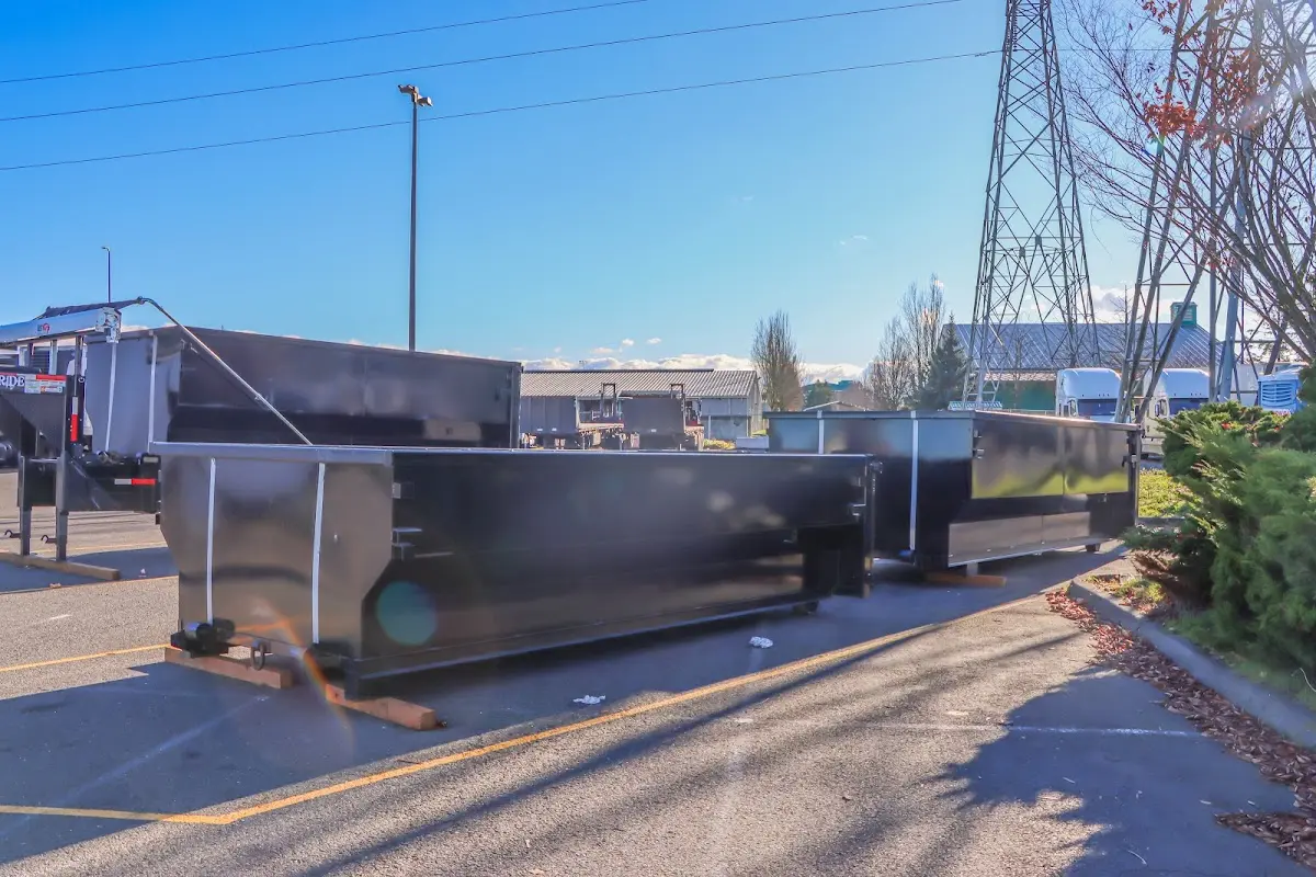 Roll-off dumpster ready for waste disposal at job site for Construction Dumpster Rental in Howell